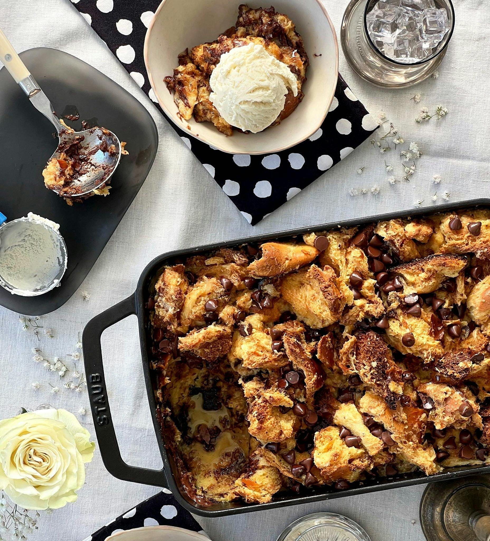 Chocolate chip bread pudding in serving dish on table